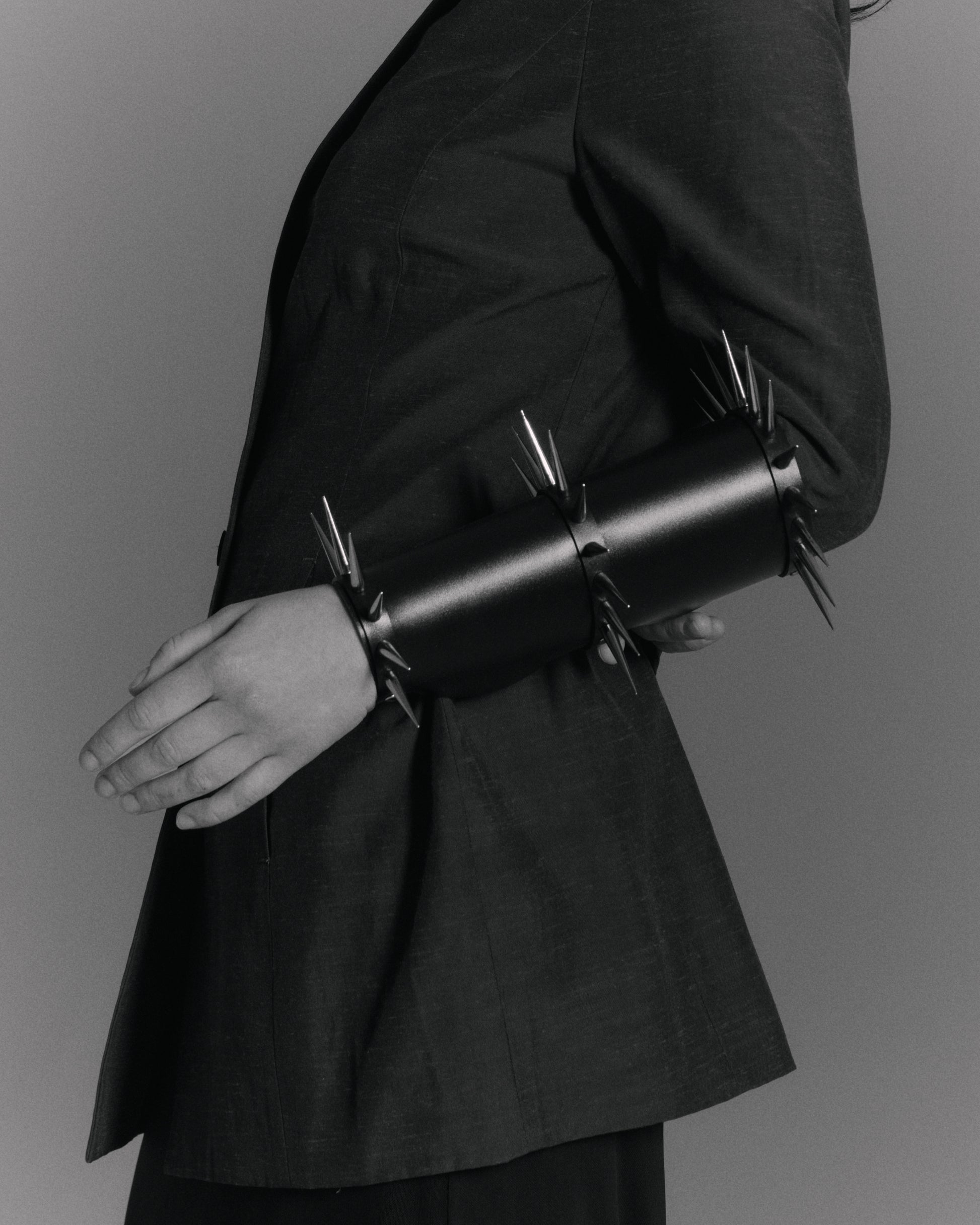     Handmade vegan PVC spiked armband in black by Klets