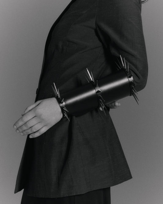     Handmade vegan PVC spiked armband in black by Klets