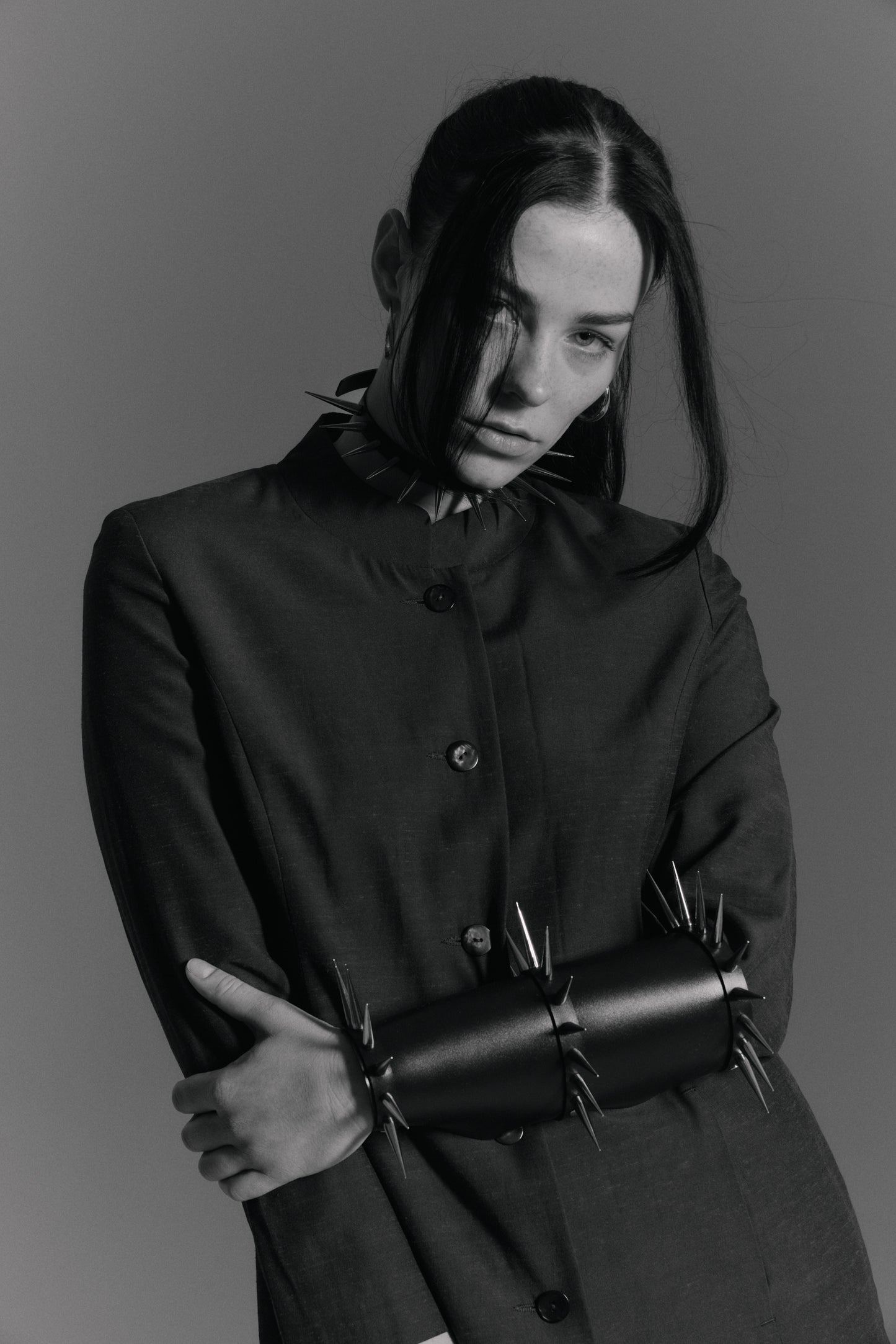     Black spiked vegan PVC arm cuff handmade in Berlin