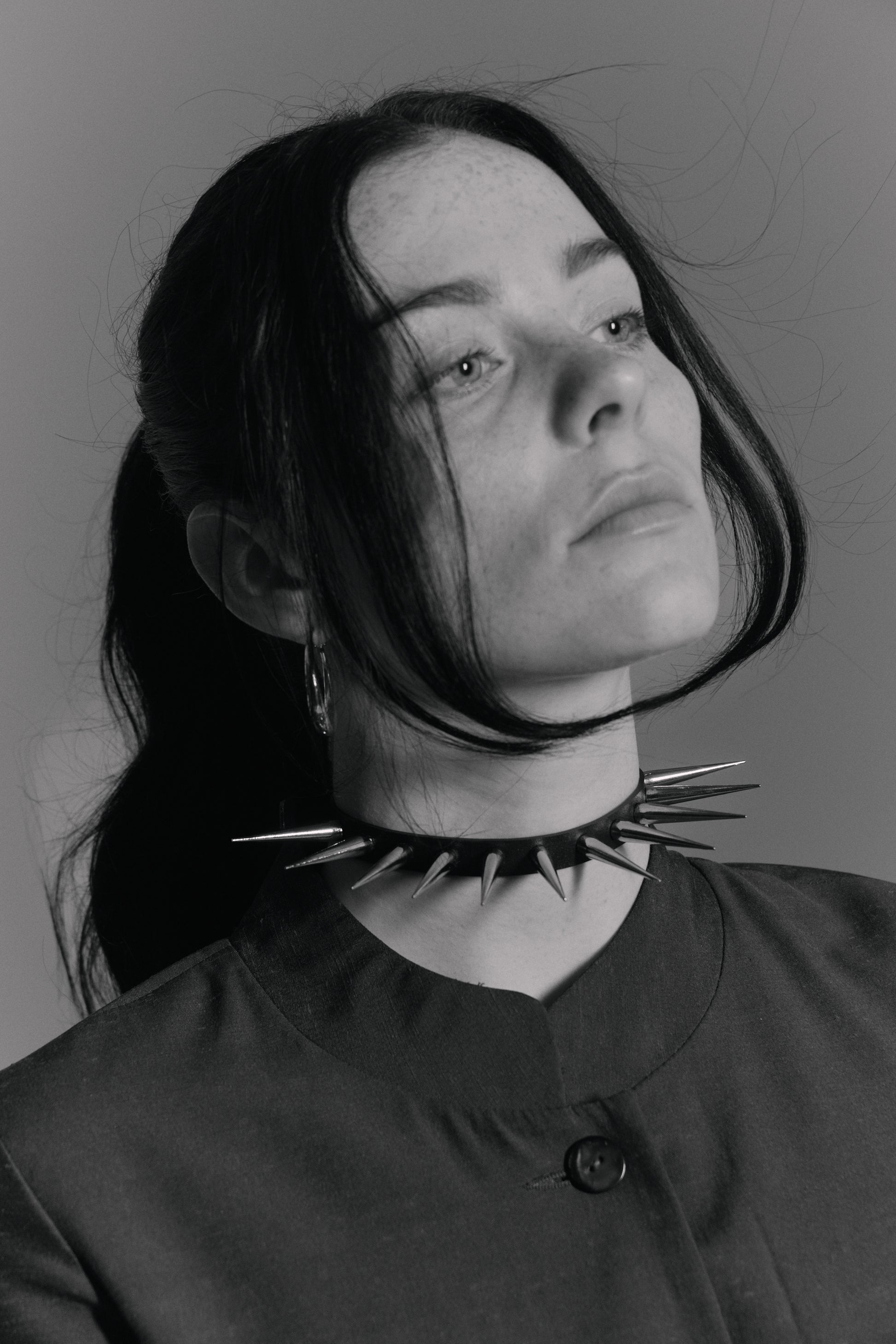     Handmade black vegan PVC spike choker with stainless steel hardware by Klets